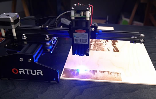 Labor embotellamiento Fuerza 15W Laser Engraver Review | ManufacturingTomorrow
