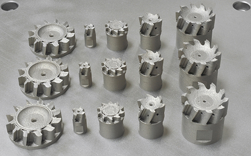 Multiple AM cutter parts produced on a single build plate. Credit: KOMET GROUP